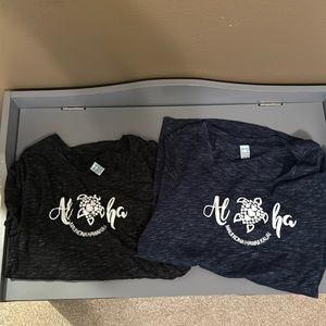 2 Hawaii t shirts one black and one blue